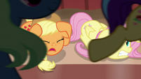 Applejack shouting at Flim and Flam as ponies stampede S6E20