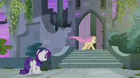 Rarity, like a lady takes her time into the castle.