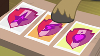 Snap pointing closely at cutie mark photos S9E12