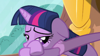 Twilight being comforted by Spike.