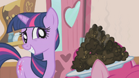 Twilight passes on Pinkie's cupcakes.