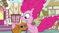 Pinkie Pie blows smoke off of guitar S7E9