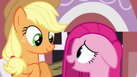 Applejack and Pinkie smiling.