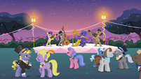 A garden party for elite ponies. Octavia Melody is playing the cello.