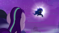 Princess Luna appears from inside the moon S6E25