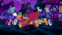 Alicorn Big McIntosh flies past the crowd S5E13