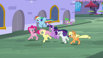 Mane Six and Spike racing through Canterlot S9E1