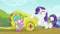 Spike next to Rarity's jeweled chariot S4E23