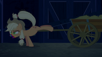 Zombie Applejack pushes hay cart out of the way S6E15