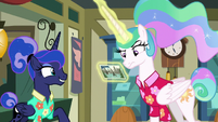 Celestia looking at Luna's postcard S9E13