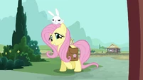 Fluttershy pays Spike a visit.