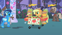 Soarin walks over to Applejack's food stand.