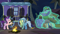 Starlight dumps Trixie's stuff out the wagon S8E19