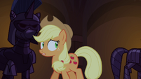 Applejack walks through hall of armor S4E03