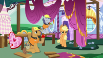 Applejack walking past construction ponies S7E9