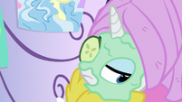 Rarity removes one of her cucumber slices S9E19