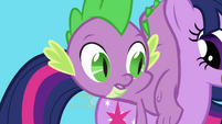 Spike lands on Twilight's back S1E01