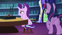 Starlight sulking next to the game board S7E24