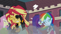 Equestria Girls shielding themselves from the wreckage EG3