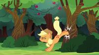 Applejack bucking an apple tree S6E18