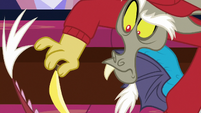 Discord holding a bananaphone S8E15