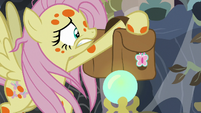 Fluttershy grabbing her saddlebags S7E20