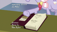 Dusty Pages stamping Twilight's last book S9E5