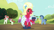 Big Mac dressing as Orchard Blossom with a handkerchief S5E17.png