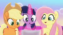 Fluttershy pointing at the letter MLPRR