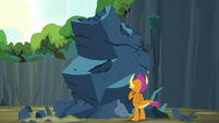 Smolder looking at the giant rock S9E3