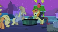 Derpy Hooves and Golden Harvest bobbing for apples.