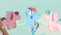 Red and pink stallions singing to Rainbow Dash S5E1