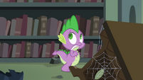 Spike being scared while walking inside the castle library S4E03