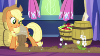 AJ pouring fertilizer in castle while flowers grow S5E03