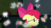 Apple Bloom surrounded by floating cutie marks S5E4