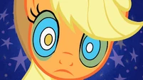 Applejack's hypnotized eyes.