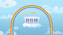 Cloudsdale gets illuminated by Rainbow Dash's rainbow.