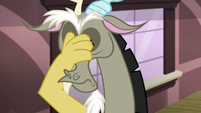 Discord smacks himself with his paw S6E17