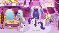 High-society ponies look at excited Rarity S6E14