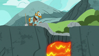 Rockhoof watches the lava fall into the water S7E16