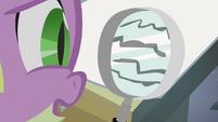 Spike reading through the magnifying glass S4E06