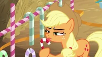 Applejack licking a candy cane BGES2