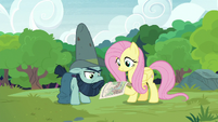 Fluttershy and Big Daddy look over the diagram S7E5