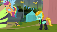 Rainbow carries Scootaloo out of the stadium S8E20