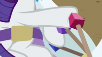 Rarity works the cart's levers S6E14