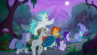 Trixie leads friends through the forest S9E11