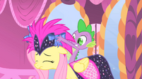 Spike loves Rarity so much, he's not noticing Fluttershy's pain.