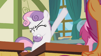 Sweetie Belle raising her hoof S2E23