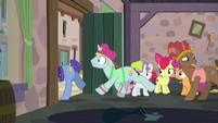 Backup dancers leaving Sugar Belle's bakery S7E8