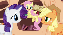 Fluttershy trying to get Rarity's and Applejack's attention S3E05